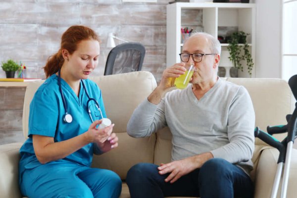 in-retirement-home-nurse-is-giving-daily-pills-to-2025-02-20-00-59-06-utc(1)